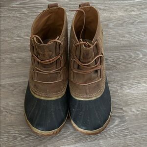 Sorel Tan and Black Rain Boots